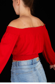 Stacy Cruz casual dressed red off shoulder top upper body…